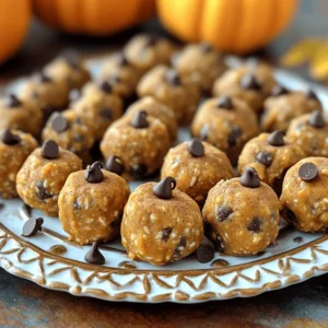 - 1 cup rolled oats - 1/2 cup natural peanut butter or almond butter - 1/2 cup pure pumpkin puree - 1/4 cup honey or maple syrup - 1 teaspoon vanilla extract - 1 teaspoon pumpkin pie spice - 1/2 teaspoon ground cinnamon - 1/4 cup mini chocolate chips or chopped nuts (optional) - A pinch of salt These ingredients are simple yet powerful. Rolled oats provide fiber and energy. Nut butter adds healthy fats and protein. Pure pumpkin puree gives a rich flavor and vitamins. Honey or maple syrup acts as a natural sweetener. Vanilla extract enhances the taste. Pumpkin pie spice and cinnamon offer warmth and aroma. Chocolate chips or nuts add texture and fun. A pinch of salt balances the sweetness. These energy bites are not only tasty but also healthy. Each bite is rich in nutrients. A serving has about 120 calories. You get around 3 grams of protein, 5 grams of fat, and 15 grams of carbs. The oats and pumpkin puree provide fiber, aiding digestion. Nut butter contributes healthy fats, improving heart health. Pumpkin is low in calories and high in vitamins A and C, which boost your immune system. Before you start, gather your tools and ingredients. You need a large mixing bowl, a spatula, and a baking sheet lined with parchment paper. Make sure your nut butter is soft for easy mixing. This step is quick but important for smooth bites. In the large mixing bowl, combine the rolled oats, pure pumpkin puree, and your choice of nut butter. Stir vigorously until the mixture is creamy. Next, add the honey (or maple syrup), vanilla extract, pumpkin pie spice, ground cinnamon, and salt. Mix well until you create a sticky dough. If you like, fold in mini chocolate chips or chopped nuts. This adds flavor and texture to the bites. With clean hands, take small portions of the dough. Aim for about 1 tablespoon for each bite. Roll them into balls and place them on the parchment-lined baking sheet. Make sure they are evenly spaced. After shaping, it’s important to chill the bites. Transfer the baking sheet to the refrigerator for 30 minutes. This helps them firm up. Enjoy your delicious pumpkin spice energy bites! To get the right texture for your pumpkin spice energy bites, focus on the mixture. First, use rolled oats for a chewy base. If the mix feels too dry, add a bit more nut butter or pumpkin puree. This helps bind everything together. Chilling is key! After you roll the bites, let them chill in the fridge for at least 30 minutes. This helps them firm up and makes them easier to eat. When it comes to serving, make them look great! You can use a decorative platter or fill small paper cups. This adds a fun touch to your gatherings. For a festive flair, sprinkle a dash of ground cinnamon or pumpkin pie spice on top. It makes them pop! For drinks, pair these bites with a warm chai latte or a cold glass of almond milk. The flavors blend perfectly, making snack time even better. Store your pumpkin spice energy bites in an airtight container. This keeps them fresh and tasty. You can use a glass jar or a plastic container with a tight lid. These bites will stay good in the fridge for up to a week. If you want a quick snack, just grab one from the fridge! You can freeze these energy bites for later. To freeze, place the bites in a single layer on a baking sheet. Put the sheet in the freezer for about an hour. Once they are firm, transfer them to an airtight bag or container. They can stay frozen for up to three months. When you’re ready to eat, thaw the bites in the fridge overnight. You can also let them sit at room temperature for a quick thaw. Enjoy them as a sweet treat or snack anytime! {{image_4}} Pumpkin spice energy bites stay fresh for one week when stored in the fridge. To keep them tasty, use an airtight container. This helps maintain their flavor and texture. If you want to enjoy them later, you can freeze them. They will last for up to three months in the freezer. Just make sure to thaw them in the fridge before eating. Yes, you can easily make these energy bites vegan! Simply replace honey with maple syrup. You can also use almond butter or any other nut butter that fits your diet. These changes keep the bites just as tasty while making them vegan-friendly. If you need to avoid oats, try using ground flaxseed or almond flour. Both options give a nice texture to the bites. You can also use puffed rice for a crunchier feel. Just remember that these substitutes might change the flavor a bit, but they will still be delicious! Here’s how to make Pumpkin Spice Energy Bites. You will love how easy they are! Ingredients - 1 cup rolled oats - 1/2 cup natural peanut butter or almond butter - 1/2 cup pure pumpkin puree - 1/4 cup honey or maple syrup - 1 teaspoon vanilla extract - 1 teaspoon pumpkin pie spice - 1/2 teaspoon ground cinnamon - 1/4 cup mini chocolate chips or chopped nuts (optional) - A pinch of salt Steps 1. First, grab a large mixing bowl. Add the rolled oats, pure pumpkin puree, and nut butter. Stir until creamy. 2. Next, mix in the honey or maple syrup, vanilla extract, pumpkin pie spice, ground cinnamon, and a pinch of salt. Keep stirring until you form a sticky dough. 3. If you want, fold in mini chocolate chips or chopped nuts for extra flavor. 4. With clean hands, scoop about one tablespoon of the mixture. Roll it into a ball. Place each ball on a parchment-lined baking sheet. 5. After shaping all the bites, put the baking sheet in the fridge. Chill them for at least 30 minutes to firm up. 6. Finally, move the chilled energy bites to an airtight container. Store them in the fridge for up to a week. For a quick snack or energy boost, these bites hit the spot! You learned how to make tasty pumpkin spice energy bites with a simple recipe. I shared key ingredients, their health benefits, and step-by-step instructions. You can try different flavors and tips to suit your taste. Remember to chill them for the best texture. These bites can be stored or frozen for later enjoyment. Now, go ahead and create your own delicious snacks that are both fun and healthy!