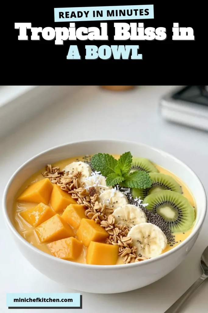 Indulge in a delicious tropical mango smoothie bowl that's both vibrant and nutritious! This healthy smoothie bowl recipe features ripe mangoes, coconut milk, and optional Greek yogurt for creaminess. Perfect for breakfast or a snack, it's an easy vegan mango smoothie with endless toppings like granola, fresh kiwi, and chia seeds. Try this coconut milk smoothie bowl today and elevate your smoothie game! Save this recipe now! #TropicalMangoSmoothieBowl #HealthySmoothieBowlRecipe #EasySmoothieBowlToppings #VeganMangoSmoothie